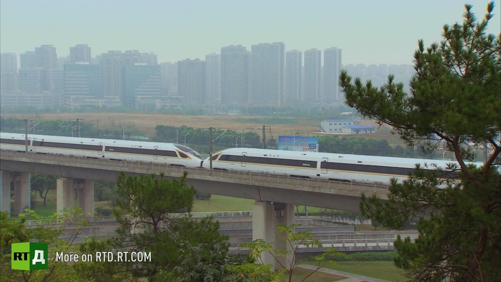 A Chinese high speed train going over a bridge. Still taken from RTD documentary Chinese Speed  in the This  is China series.