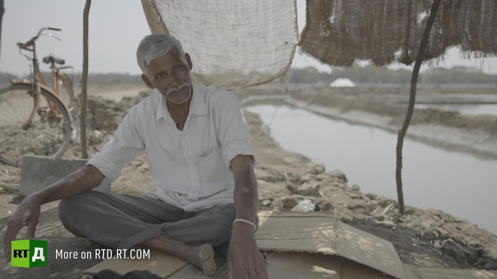 Indian salt farmer. Still taken from RTD documentary Gandhi's Footsteps.