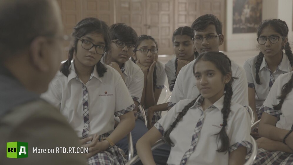 Indian children in school uniform. Still taken from RTD documentary Gandhi's Footsteps.
