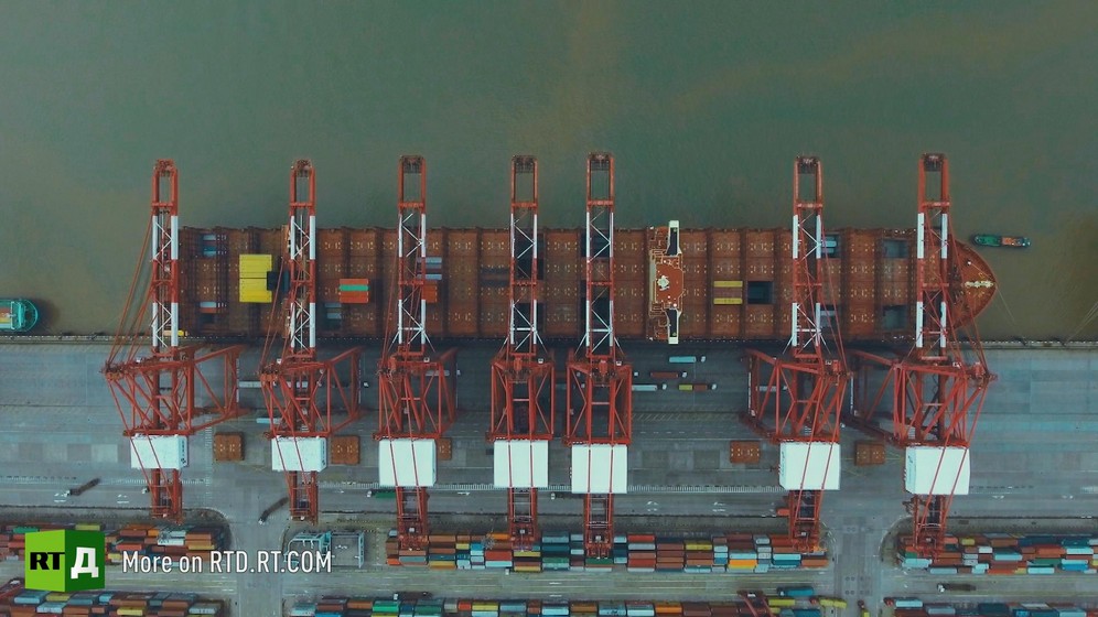 Container ship in Yangshan city port, China, seen from crane. Still taken from RTD documentary Yangshan City Port in the Still taken from RTD documentary Yangshan City Port in the 'This is China' series.
