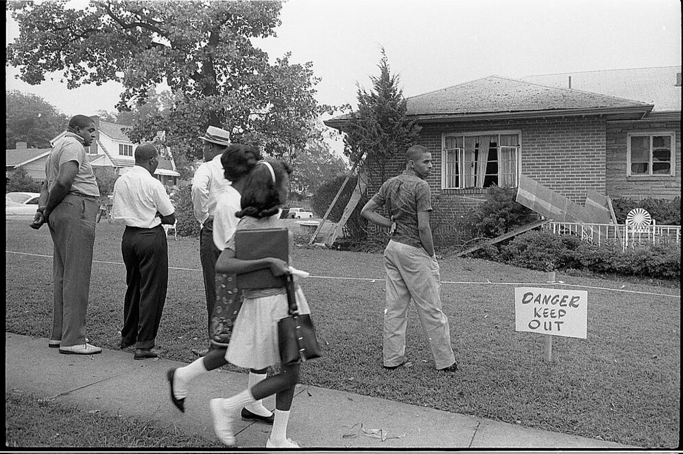 people viewing the bomb-damaged home of a black attourney in alabama