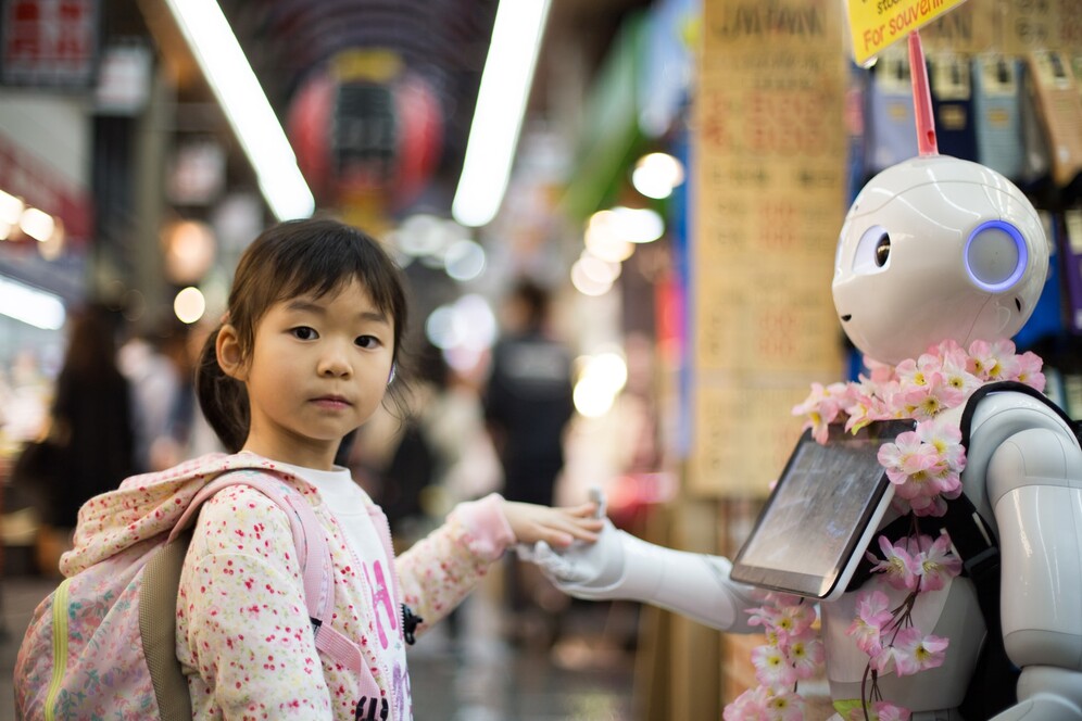 japanese girl making firends with robot