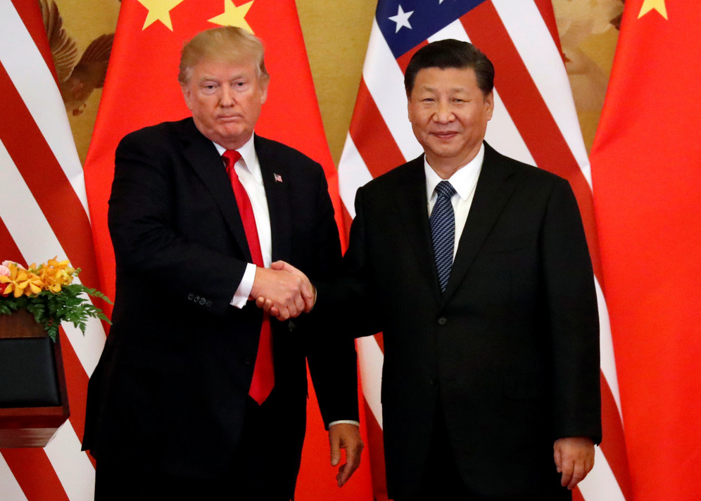 Trump and Jinping shake hands at Great Hall of the Poeple in Beijing