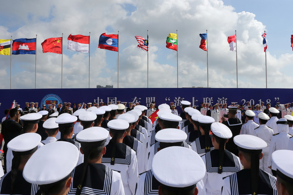 Chinese soldiers and sailors with other ASEA military standing during opening ceremony of China-ASEAN Maritime exercise