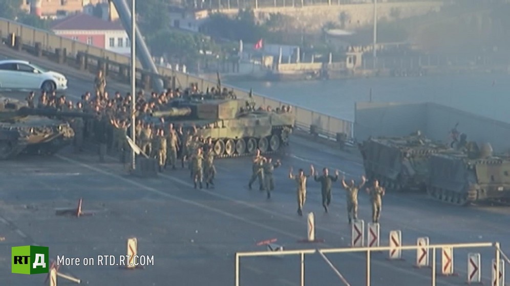 Soldiers surrendering on a bridge in Istanbul, with tanks in the background, follwing the failed military coup of 15 July 2016. Still taken from RTD's documentary series on Fethullah Gulen, The Gulen Mystery, Episode 1: Gulen's Schools.