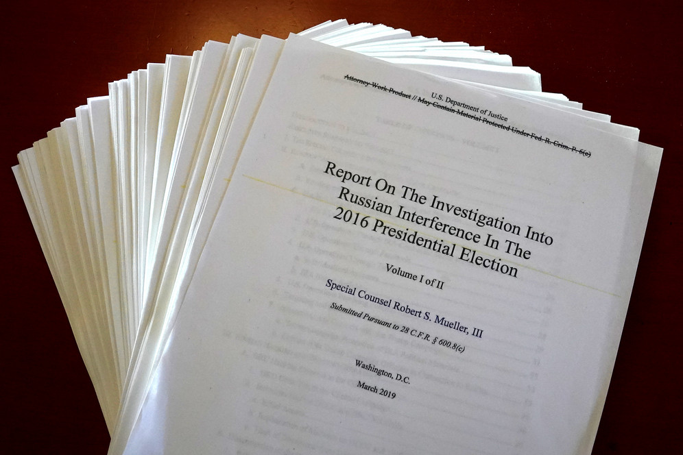 The Mueller Report on Trump-Russia collusion. A stack of copies.