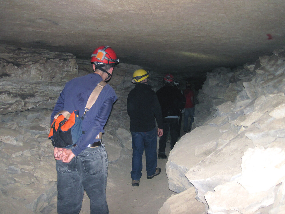 Explorers walk through Collins Avenue in Mammoth Cave