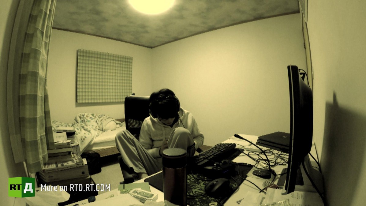 All the time Ito listen to music or surf sites on the web, play video games / © A still from the documentary film, Hikikomori Loveless / RTD